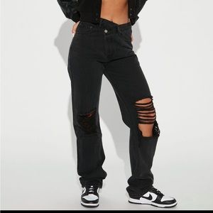 Distressed crossover jeans